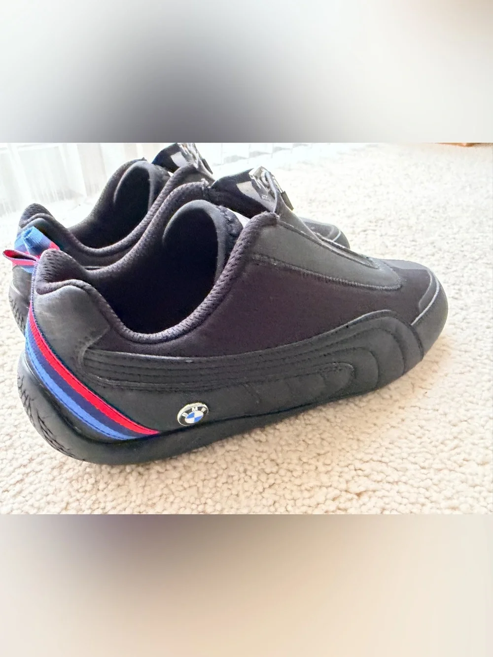 Puma Black low-profile Sneakers with Red & Blue Heel Accents